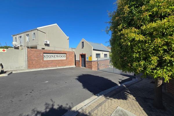 This double-storey townhouse for sale in Brackenfell South in a secure complex is an ...