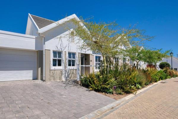 Enter the front door of this delightful cottage and look straight through the lounge to the picturesque False Bay, Cape Point and Table ...