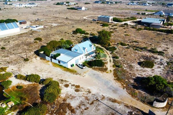 Discover tranquility in Longacres Country Estate with this distinctive double-story ...