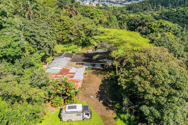 Nestled in the heart of Cowies Hill Park, this expansive 48,256m2 property offers the ...