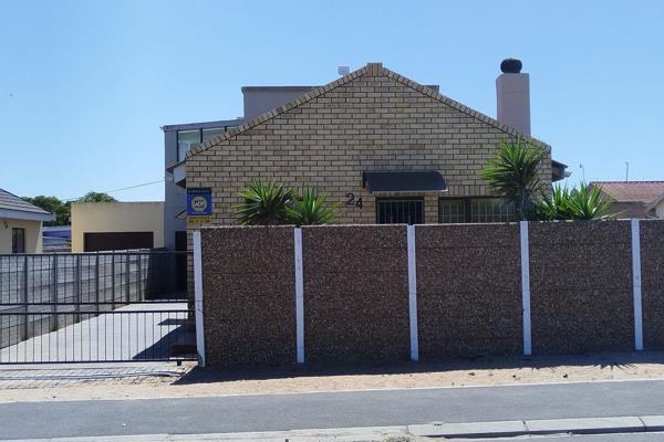 Nestled in the heart of Diazville, Saldanha Bay, this home is the perfect space to welcome your family with open arms. 

This 3-bedroom ...