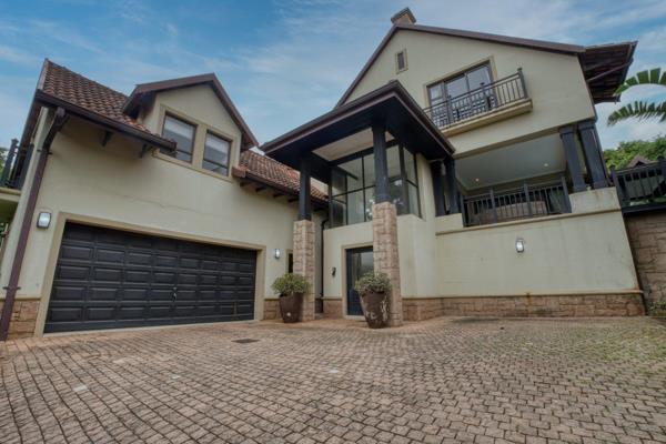 Tucked away in the lush coastal forest of Zimbali Estate, this exquisite 4-bedroom home ...