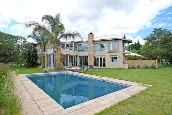 Designed for modern luxury living, the home boasts double-volume ceilings, expansive stack away doors, and seamless indoor-outdoor ...