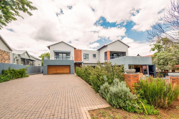 Tucked away in a peaceful cul-de-sac next door to a vibrant, lush green park, this exquisite double-story residence exudes both charm ...