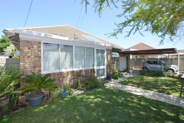 Nestled in a serene neighborhood, this delightful three-bedroom home offers the perfect ...