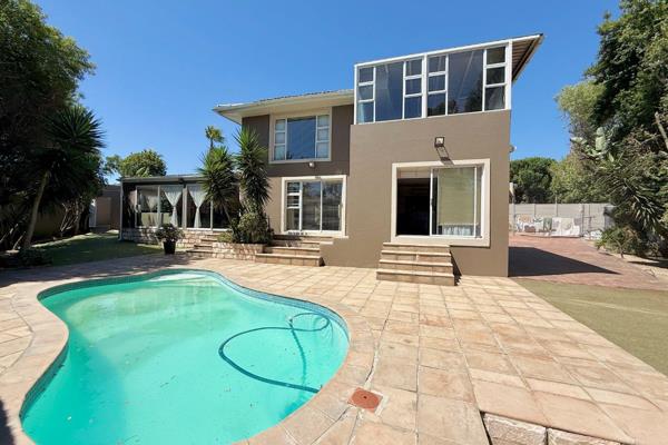 Nestled in the sought-after suburb of Plattekloof 1, this spacious and secure home ...