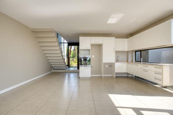 This unfurnished townhouse offers an effortless lock-up-and-go lifestyle. It perfectly ...