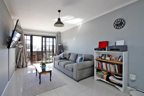 This sunny two-bedroom apartment is modern and practical. 
Open-plan lounge/dining area ...