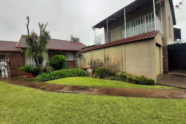 This property a lovely move in and stay with a immaculate garden .  When entering this warm welcoming home through the tiled entrance ...