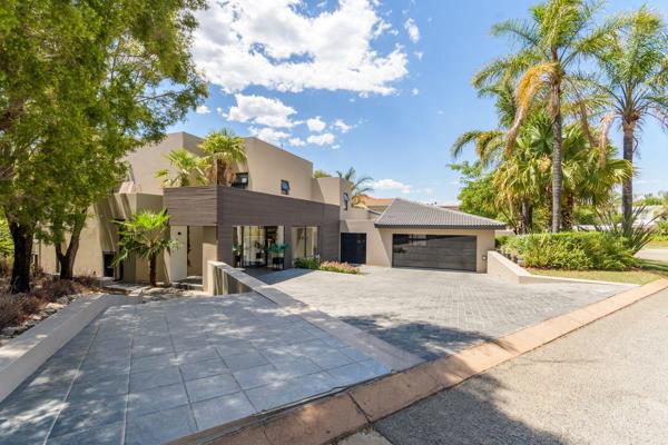 This luxurious modern home in the prestigious Dainfern Golf Estate epitomizes contemporary living at its finest. Nestled on the golf ...