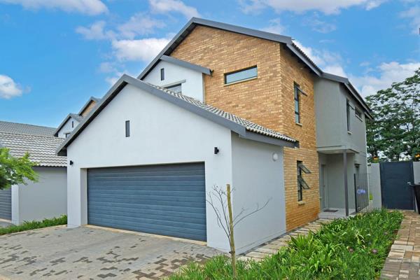 Step into this stunning modern family home, where open-plan living meets effortless comfort.

As you walk through the front door ...