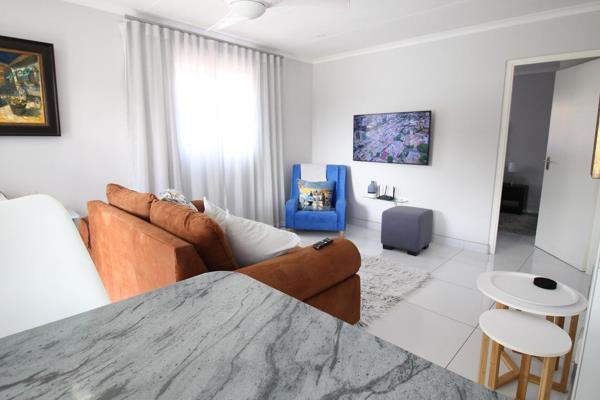 Beautiful upmarket, fully furnished property to rent in Beacon Bay, offering an undercover built-in braai area, sparkling swimming ...