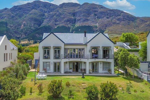 Boasting some of the finest views in Franschhoek this sophisticated home also benefits from secure living on the slopes of the Fransche Hoek Estate surrounded by vines, olives and indigenous fynbos. In an exclusive elevated position, this home is located in a small cul-de-sac ...