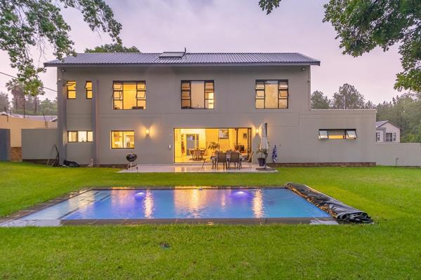 Nestled in the heart of Bryanston, this exquisite double-storey executive home exudes ...