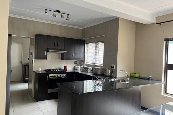 Spacious four bedroom property with plenty living space (2x lounges and a dinning area), a patio with built-in braai and small ...