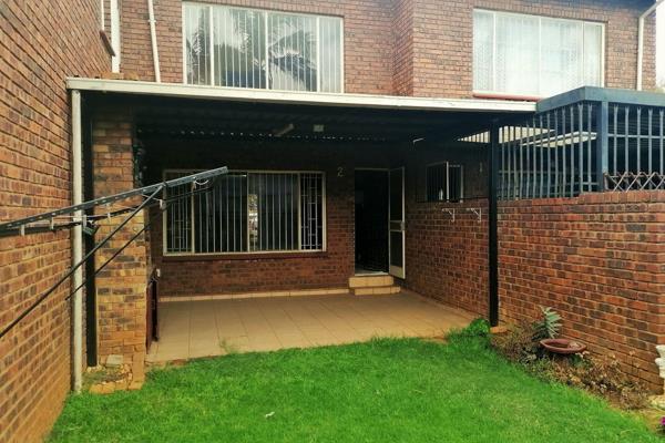 Kitchen with built-in cupboards and a stove
Open plan lounge and dining area
Both bedrooms have built-in wardrobes
First bathroom with ...