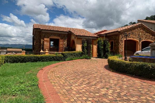 A stunning 4-bedroom house for rent in the exclusive Estate D&#39;Afrique, located in the picturesque Hartbeespoortdam.

Features:

- 4 ...