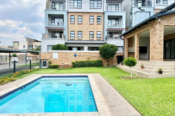 This modern apartment in a secure, centrally located complex is an ideal home for a ...