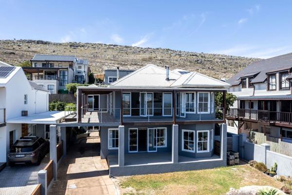 Welcome to this stunning 4-bedroom, 3.5-bathroom oasis perfectly nestled against the breathtaking mountainside of Scarborough. This ...