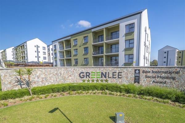 Nestled within the serene Greenlee Estate, this beautifully designed first-floor unit ...