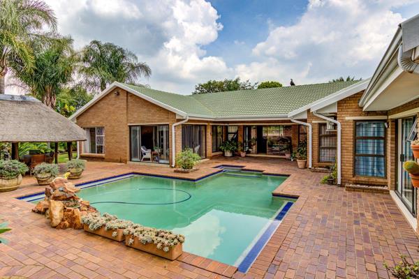 Situated in the heart of secure Sunward Village, this magnificent corner home flaunts ...