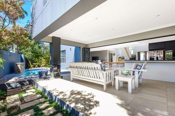 This stunning and contemporary 4-bedroom residence is perfectly positioned in the heart ...