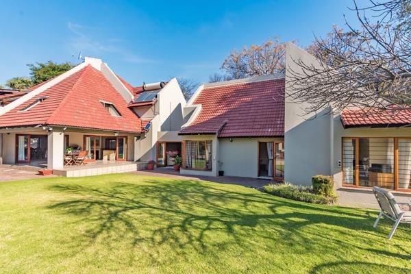 A comfortable haven nestled in a tranquil, boomed enclosure, offering a perfect blend of both grand entertaining and the cosy family ...