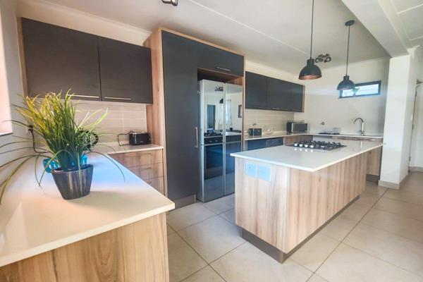 This well-maintained first-floor unit offers a secure and peaceful living environment with a sparkling pool, outside braai area, and ...