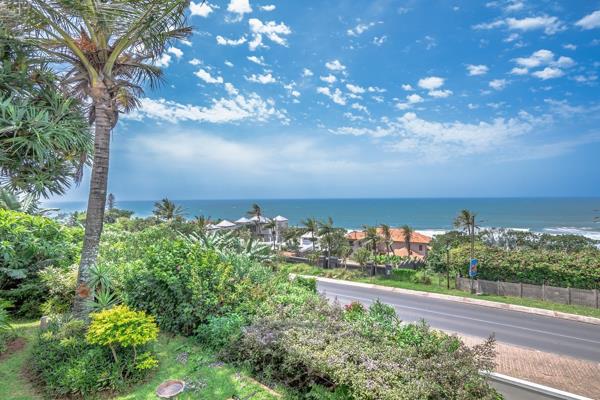 Unwind in paradise at this stunning, fully renovated beachfront apartment, perfectly ...