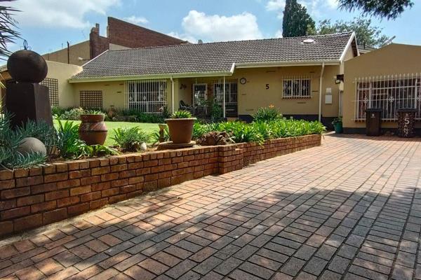 Nestled in the highly sought-after suburb of Lambton, Germiston, this expansive ...