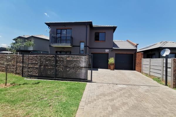 Kitchen with tiled floor, built in cupboards and a stove 
lounge is open plan and tiled
bedroom 1 is tiled and has built in cupboards ...