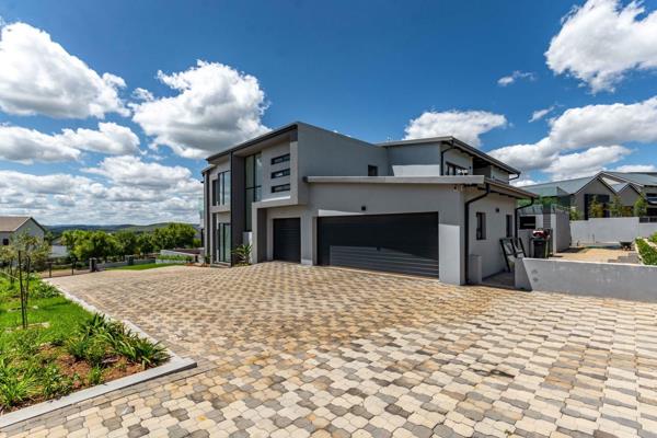 This exquisite 5-bedroom home in the prestigious Copperleaf Golf Estate offers the perfect blend of modern elegance and comfortable ...