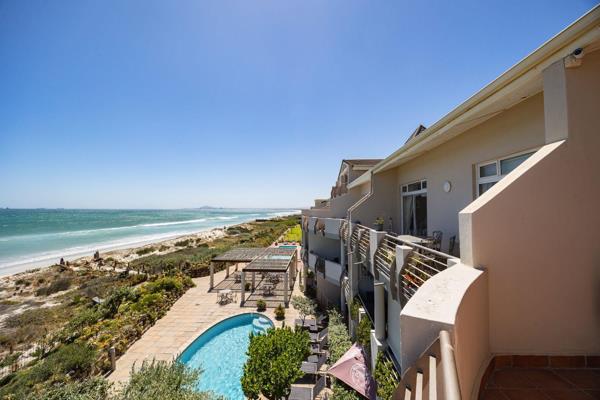 Experience serene seaside living in this spacious 1 bedroom, 1 bathroom beachfront ...