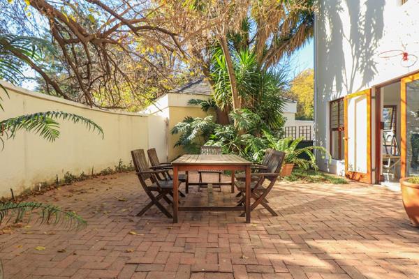 Large wooden sash windows let the light into this eclectic home. A double story with 3 ...