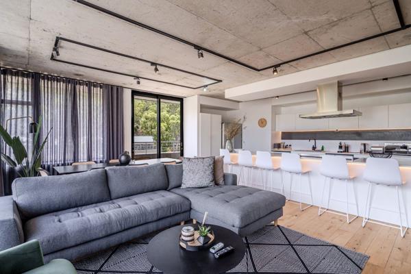 This stylish two-bedroom, two-storey penthouse apartment at FORTY ON L in Bo-Kaap is an ...