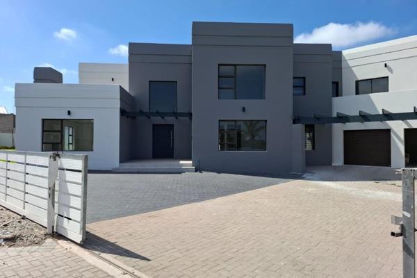 Embrace the modern coastal living in this stunning double-storey residence nestled in the sought-after Myburgh Park.

This exceptional ...