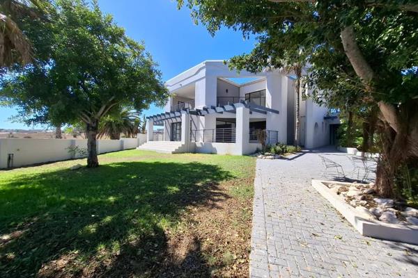 Embrace coastal living at its finest in this magnificent double-storey home nestled in a quiet cul-de-sac in the sought-after Myburgh ...