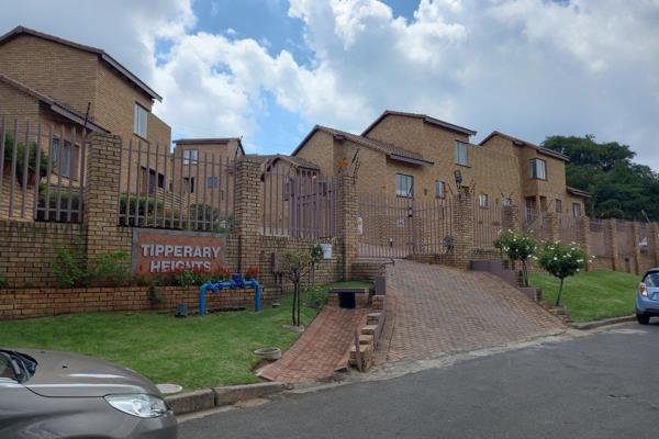 This spacious 3-bedroom townhouse offers comfortable living with an open-plan kitchen ...