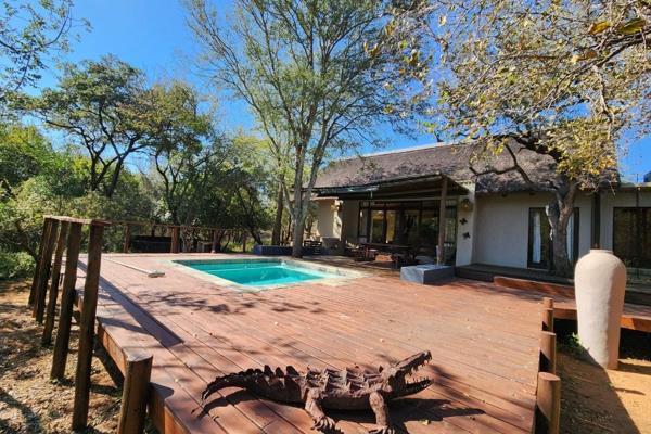 Set on a dry riverbed deep into the estate, this fully furnished  authentic bushveld home offers the perfect blend of comfort and ...