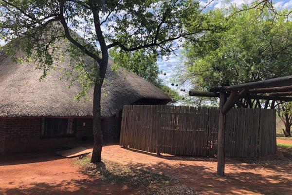 &quot;excellent return on investment&quot;. This beautiful thatch roof unit is for sale.  The main bedroom has a queen size bed and en-suite bathroom. The second bedroom has 2 single beds and a separate bathroom. It sleeps a maximum of 4 people.  The unit also consists of an ...