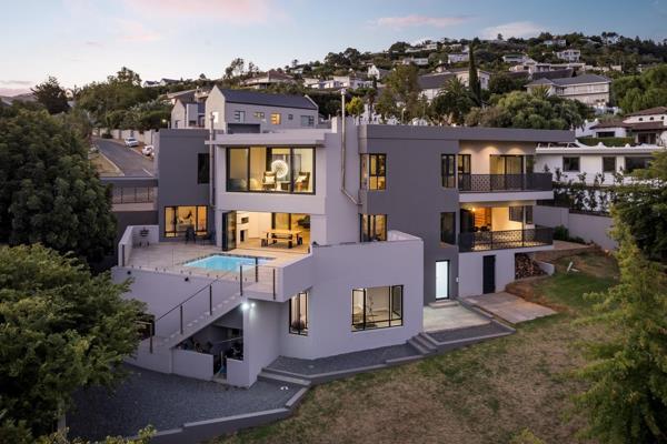 Exclusive Marketing by Chas Everitt -Pieter Kotze and Wanda van Wyk

Spectacular new home on the slopes of the Helderberg Mountain with ...