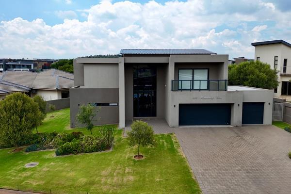 Welcome to this exquisite, contemporary 4-bedroom home, perfectly situated within the ...