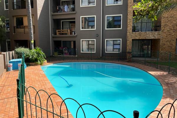 Welcome to your dream home in the highly sought-after *Arches of Rivonia* complex! This ...