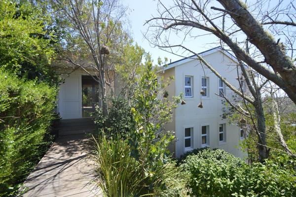 LONG TERM RENTAL: A lovely, unfurnished home with an outlook towards the Tsitsikamma Mountains and glimpse of the sea in a private ...