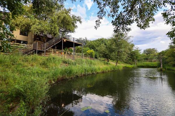 This stunning 5-bedroom, 4.5-bathroom home is a true retreat, offering uninterrupted views of the Drakensberg Mountains and a prime ...