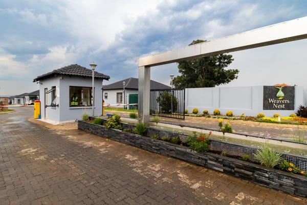 Welcome to Weaver&#39;s Nest, a modern cluster home nestled within the secure and sought-after Parklands Estate. This inviting property ...