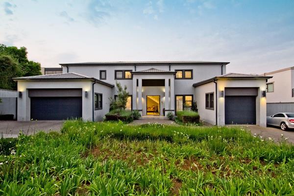 Situated in Sandton&#39;s finest and most sought after estate, this modern home is a ...