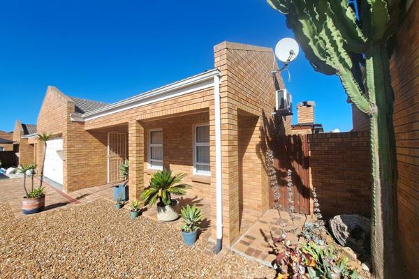 Nestled in a crescent within Eikenbosch Estate, this low-maintenance, free standing face brick home with aluminum frames offers ...