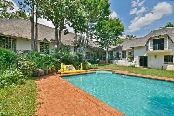 Positioned in the heart of Bryanston within a secure, boomed-off street, this unique property offers a rare blend of space ...