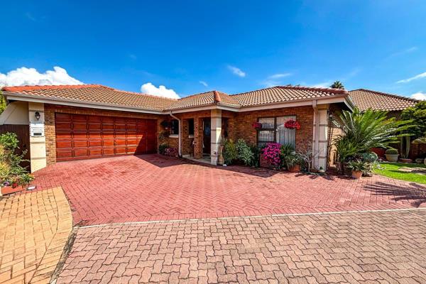 This charming home features an open-plan lounge and dining area, leading to a spacious kitchen with a gas stove and ample room for a ...